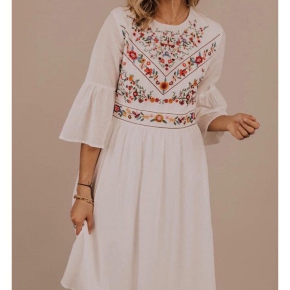 White embroidered dress with flare sleeves